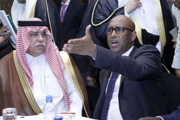 Kenya's Industry, Trade and Cooperatives Cabinet Secretary Adan Mohammed (center), flanked by Saudi Arabia's Minister of Commerce and Investment Majed Bin Abdullah Al Kassabi (left), speaks at a forum at Villa Rosa Kempinski Hotel in Nairobi on April 12, 2017. Resolutions seen by the Sunday Nation show that Saudi Arabia and Kenya agreed to work together on a number of issues. PHOTO | DIANA NGILA | NATION MEDIA GROUP.